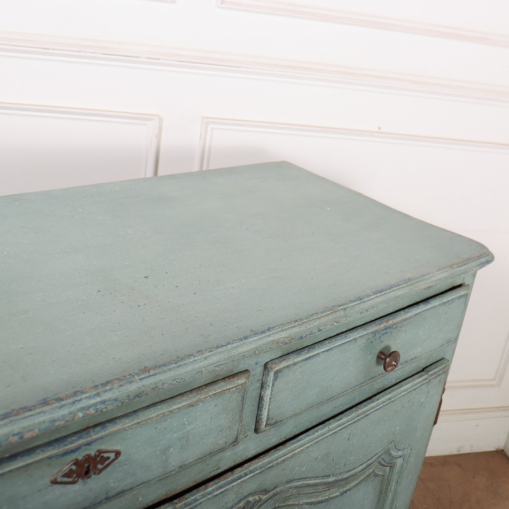A 19th-century French provincial painted wooden buffet with three drawers above two carved panel doors in a distressed soft blue finish. View X