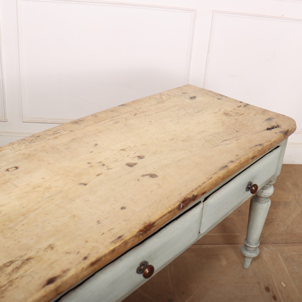 A 19th-century Welsh painted server featuring a natural wood top, three drawers with turned handles, and grey painted turned legs. View VII