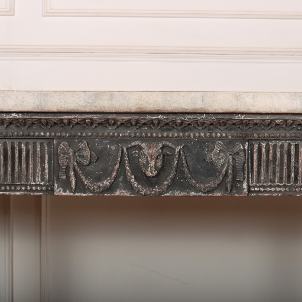 A Neoclassical dark grey painted console table with a marble top, featuring carved garland festoons and fluted tapered legs. View V