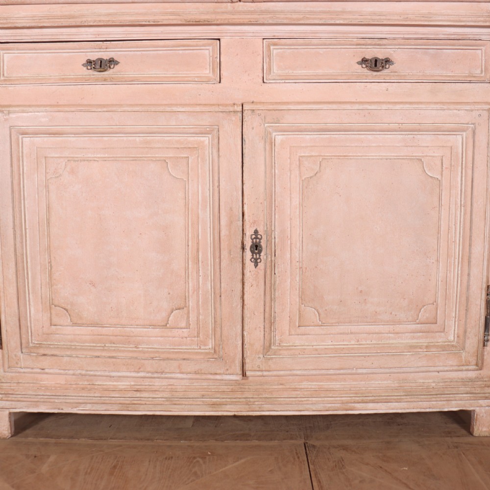 A nineteenth-century French painted glazed dresser featuring arched multi-pane glass doors with a green interior above two drawers and cupboard doors. View IV