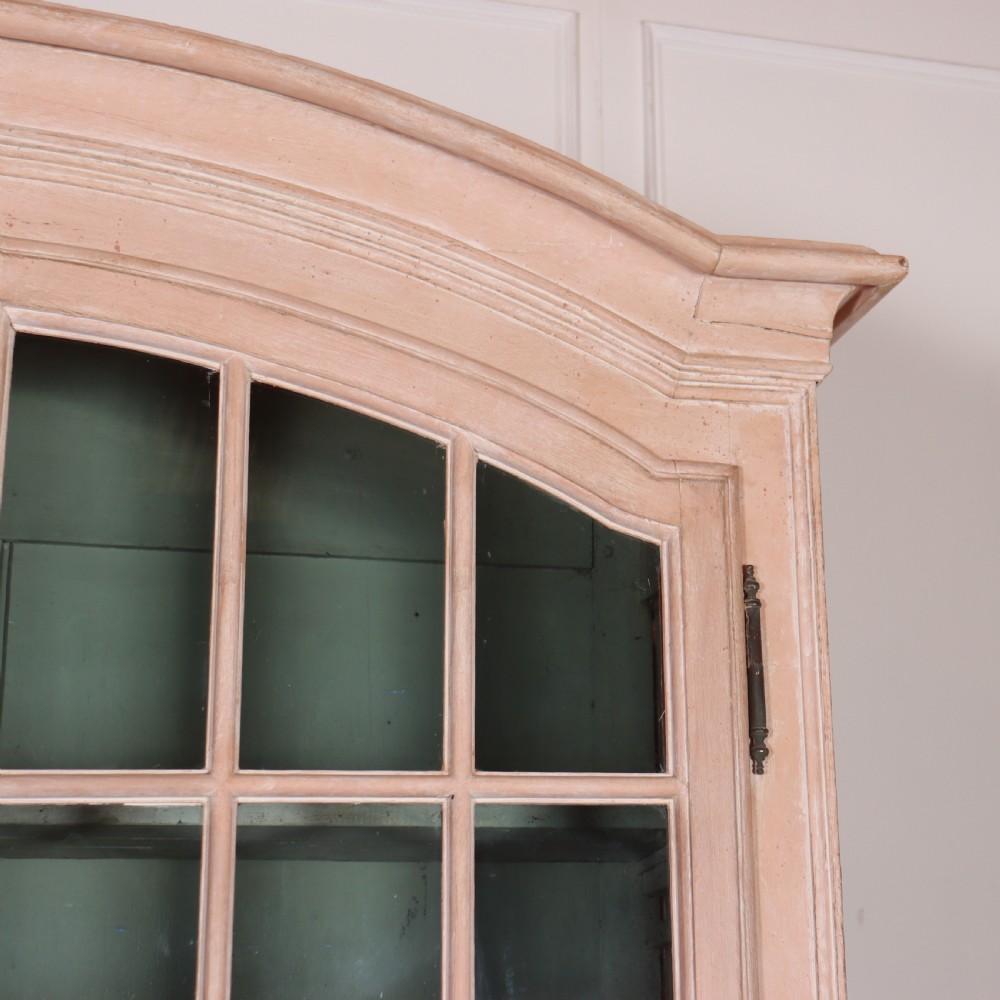 A nineteenth-century French painted glazed dresser featuring arched multi-pane glass doors with a green interior above two drawers and cupboard doors. View VIII