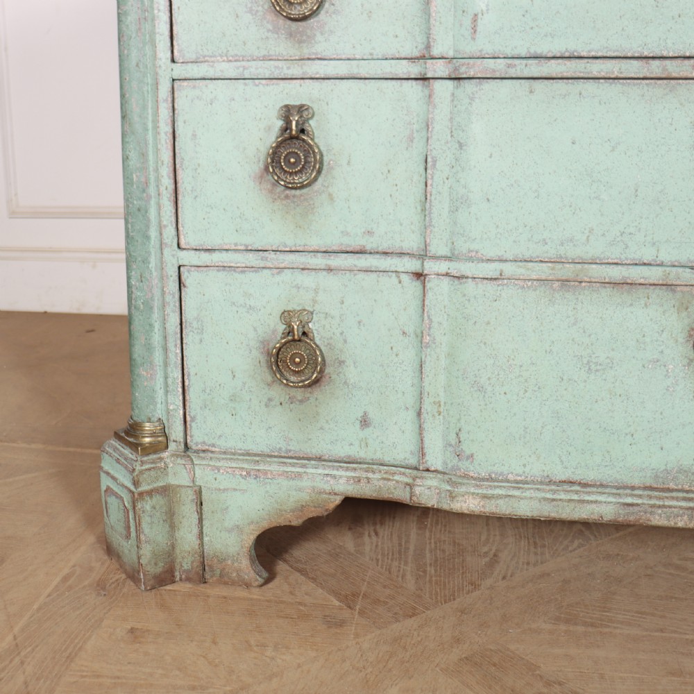 An 18th-century Dutch breakfront commode featuring a pale green painted finish, four drawers with brass ring handles, and a light marble top. View III