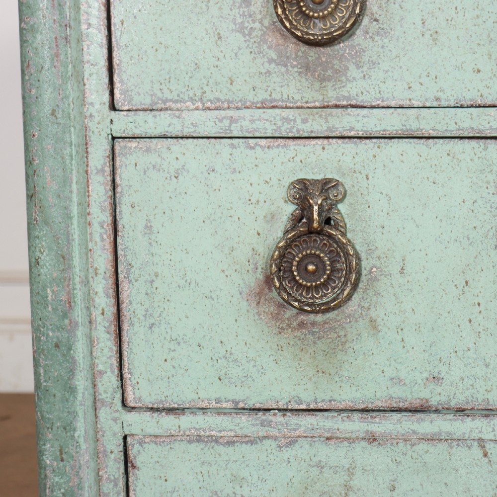 An 18th-century Dutch breakfront commode featuring a pale green painted finish, four drawers with brass ring handles, and a light marble top. View VIII