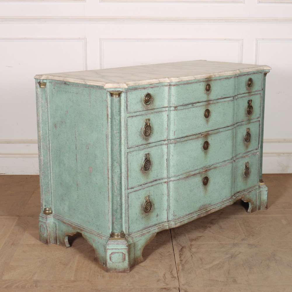 An 18th-century Dutch breakfront commode featuring a pale green painted finish, four drawers with brass ring handles, and a light marble top. View X