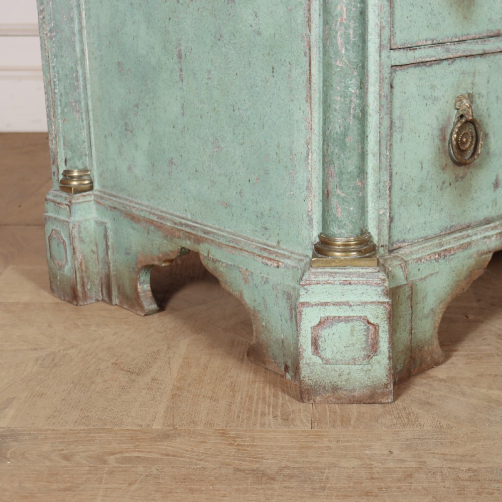 An 18th-century Dutch breakfront commode featuring a pale green painted finish, four drawers with brass ring handles, and a light marble top. View XI