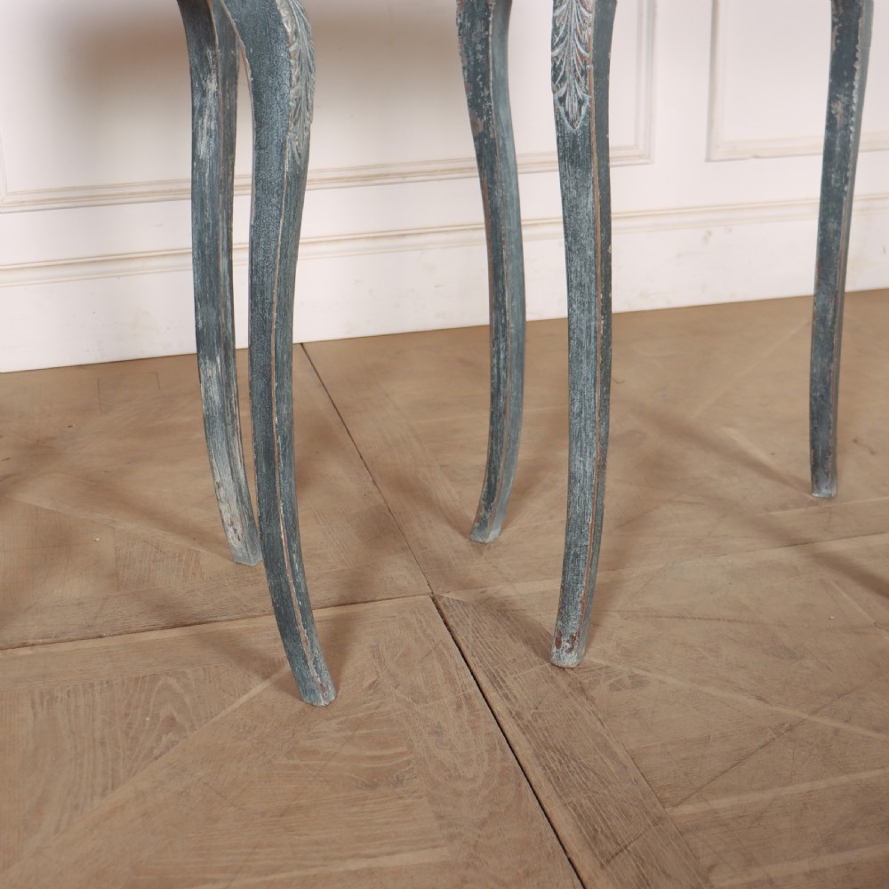 A pair of slim French painted wooden lamp tables featuring cabriole legs and oval marble tops. View IV