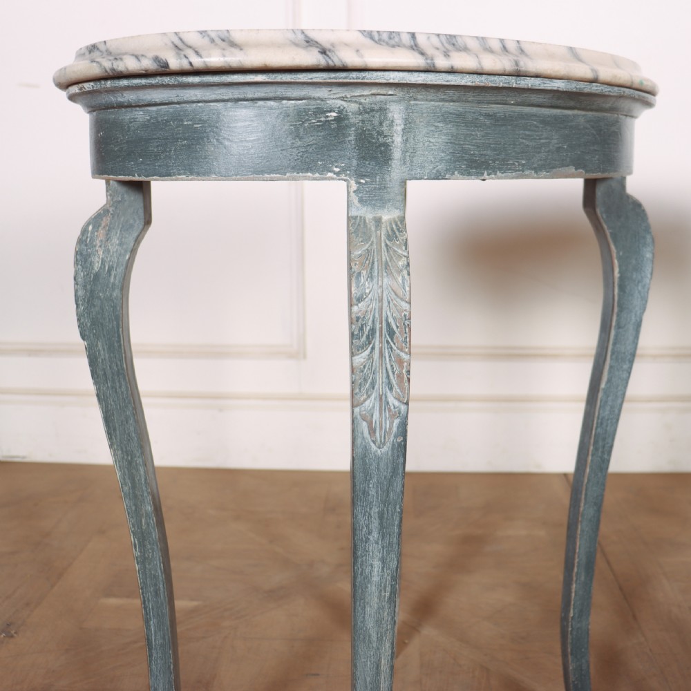 A pair of slim French painted wooden lamp tables featuring cabriole legs and oval marble tops. View VII