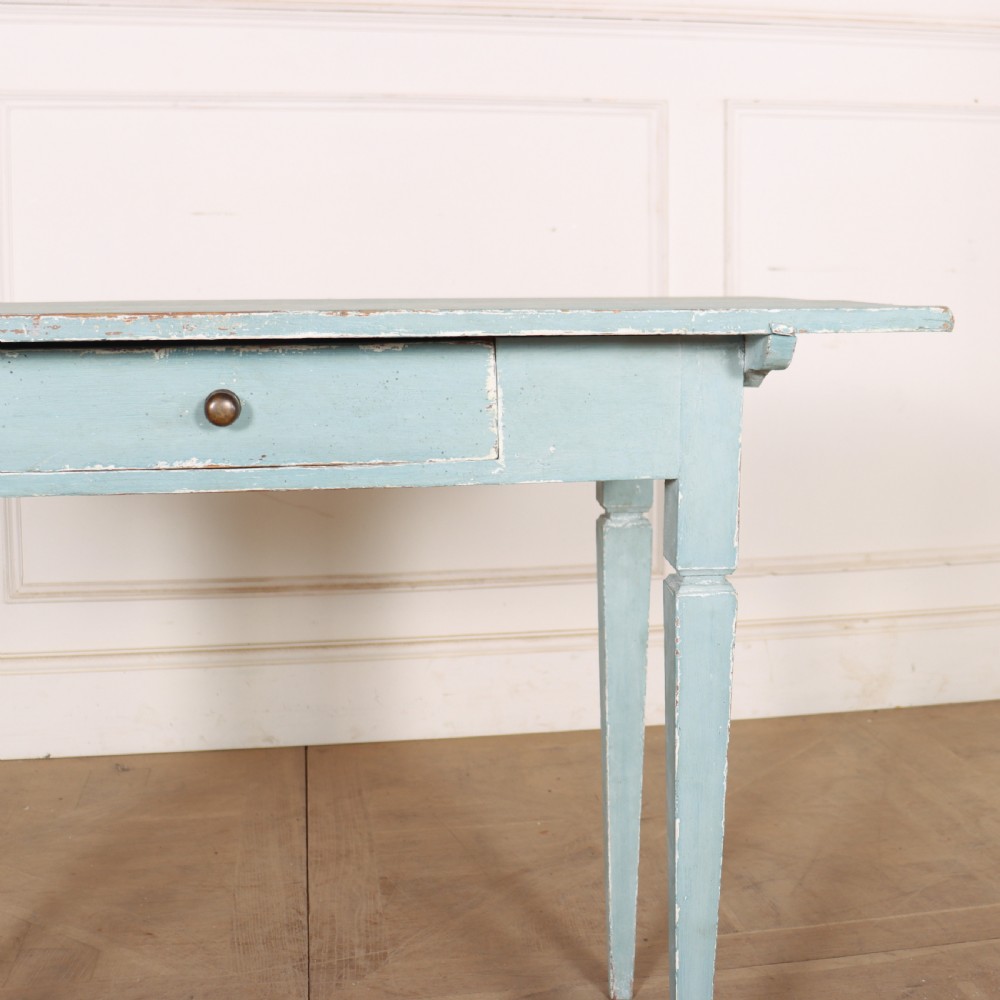 A rectangular light blue painted wooden lamp table featuring square tapered legs and a single drawer with a round brass knob. View III