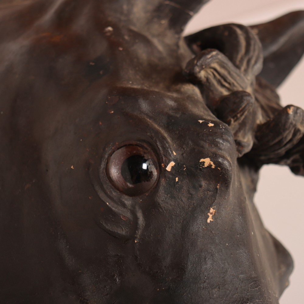 A 19th-century dark painted plaster wall-mounted bust of a horse head in profile showing fine carved details. View XII