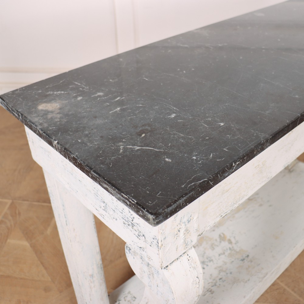 A French provincial painted wooden console table featuring a dark marble top and a lower display tier. View XI