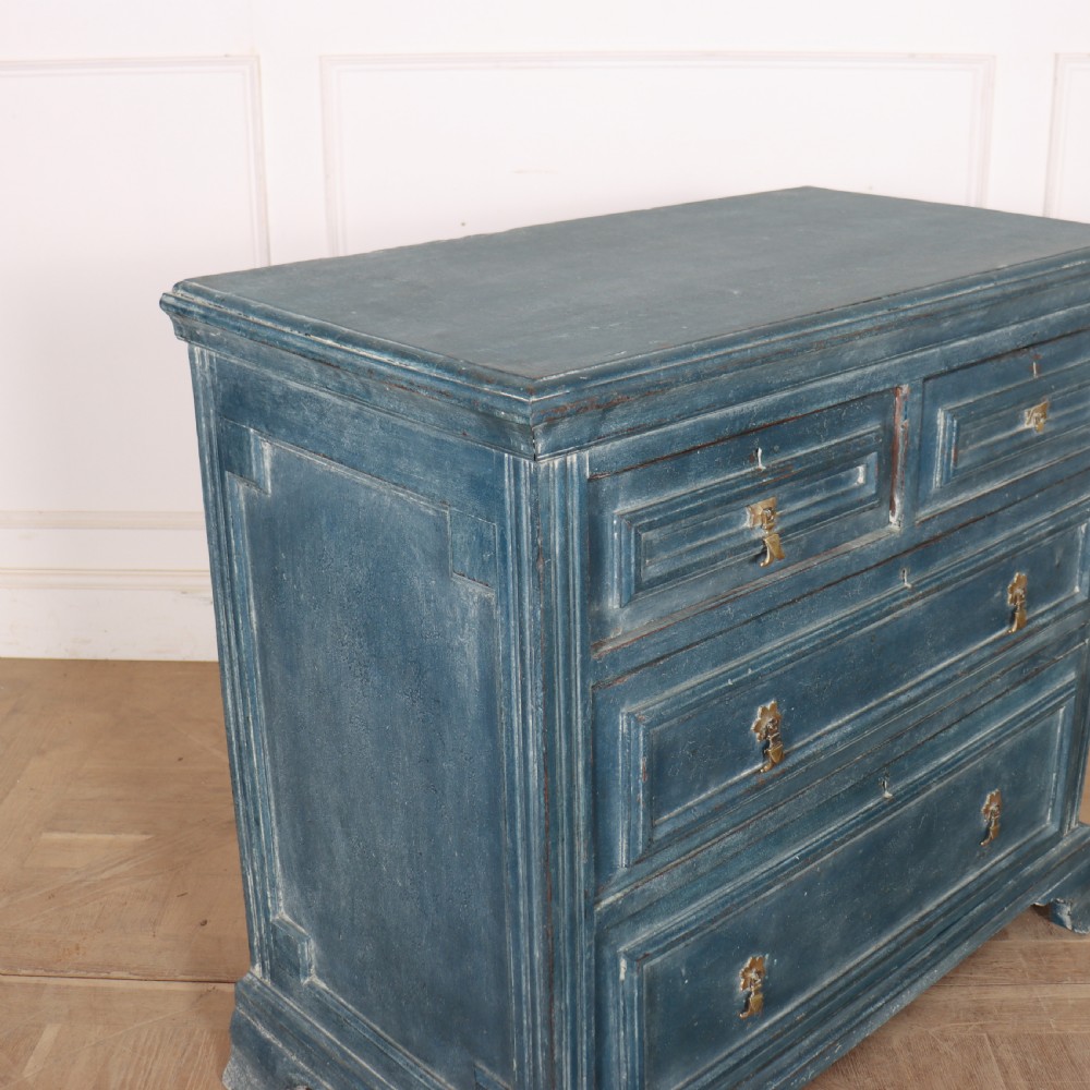 A Danish painted blue wooden commode featuring three drawers with brass handles and moulded panel details. View III