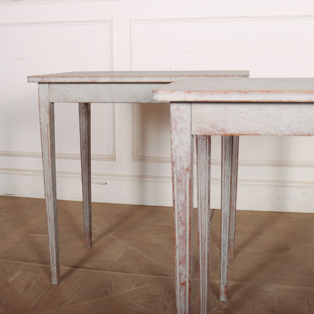 A pair of tall rectangular Swedish side tables with distressed pale grey painted finishes and slender tapered legs. View III