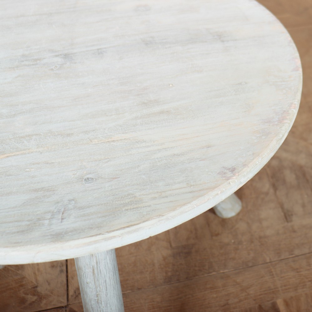 A circular three-legged English cricket table with a pale blue-grey painted finish. View III