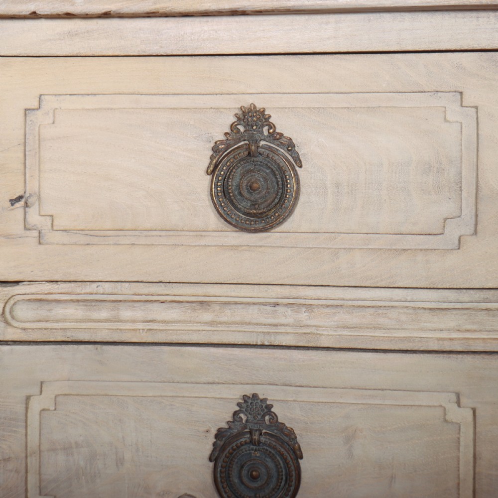 An off-white painted Italian serpentine front commode with two long drawers, panel moulding, metal handles, and square tapered legs. View VIII