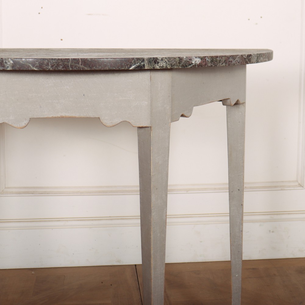 A 19th-century demilune console table featuring a grey marble top and a light grey painted frame supported by four tapered square legs. View III
