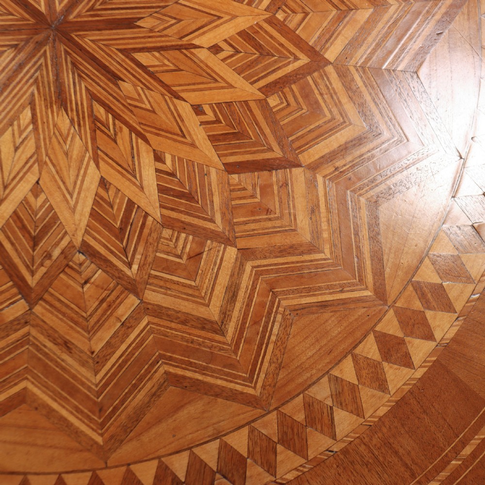 A circular 19th-century Swedish birch centre table featuring a turned central pedestal column resting on curved feet. View IX