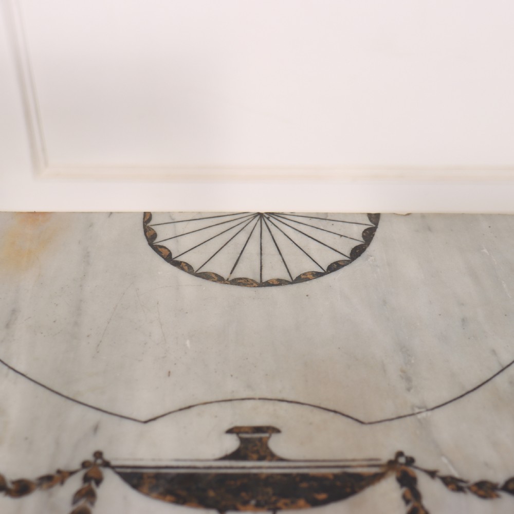 A French Louis XVI style cream painted and gilded demi-lune console table with tapered legs. View VII