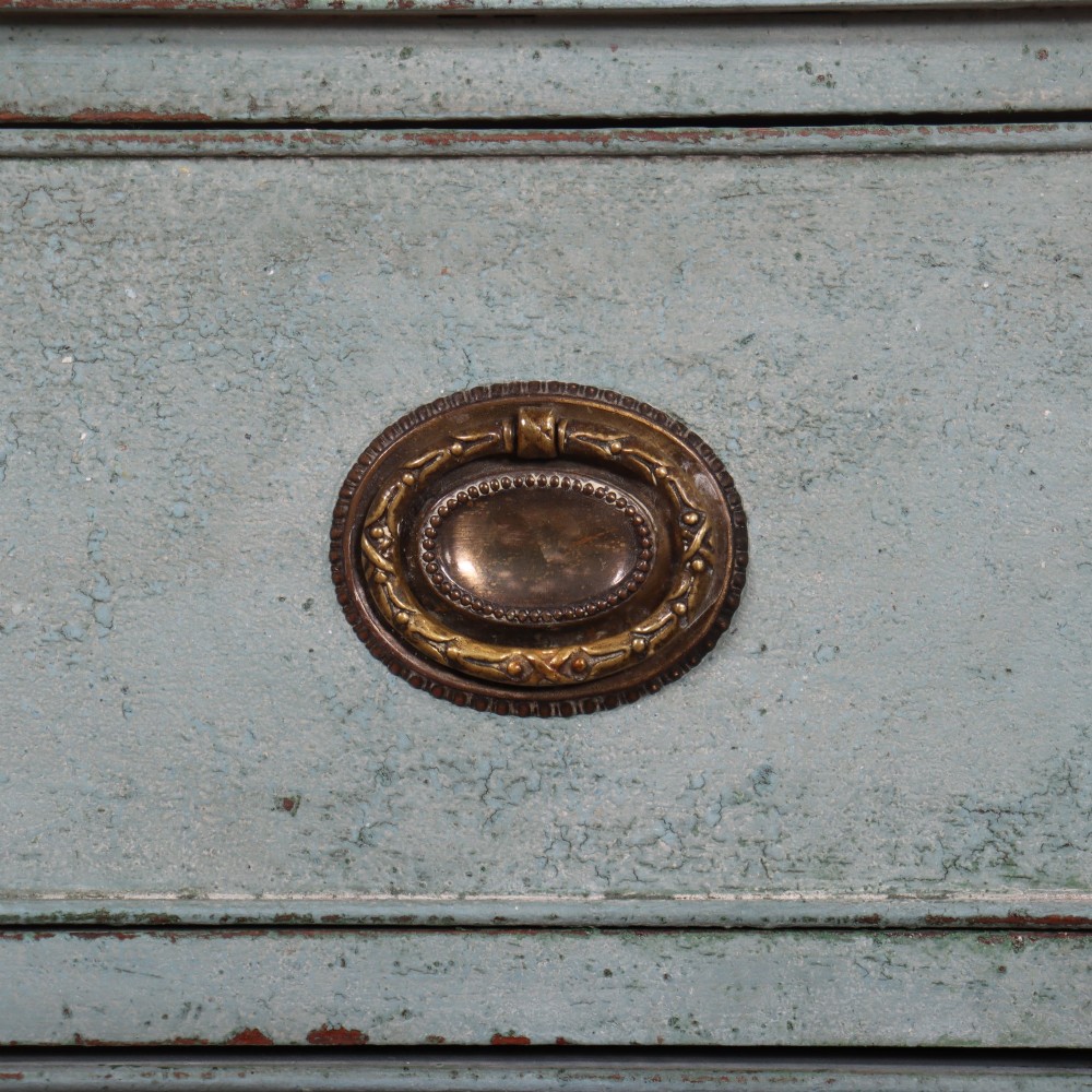 A pale blue painted Swedish commode with four drawers, oval brass pull handles, and square tapered feet. View VI