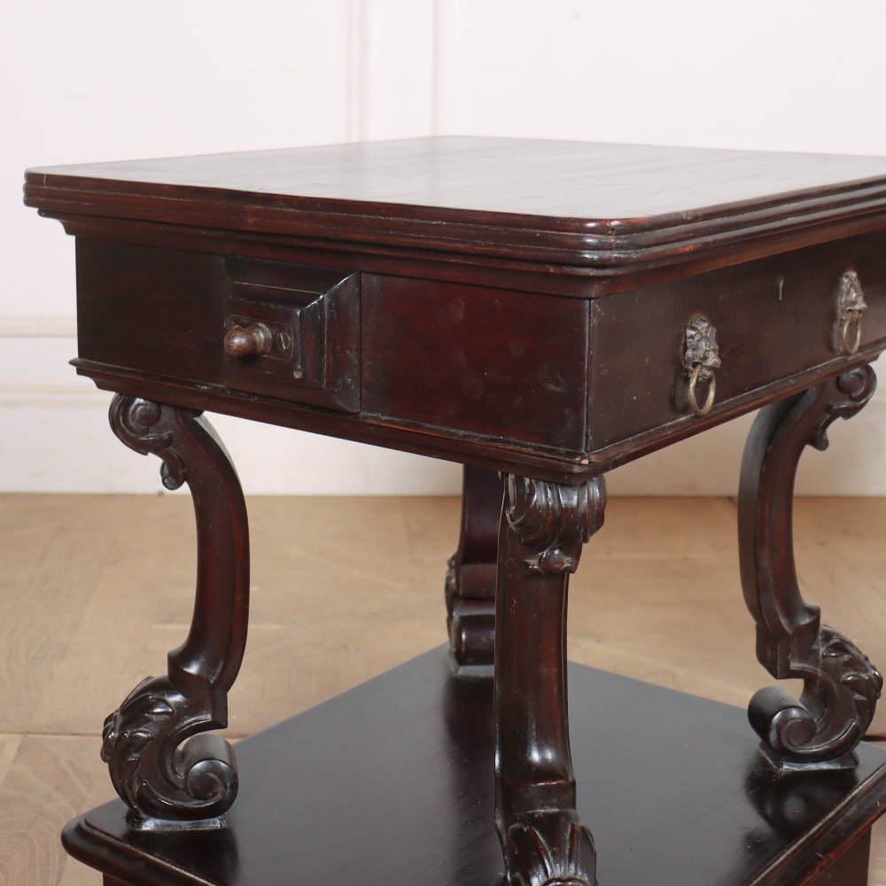 A pair of dark mahogany Irish bedside tables featuring upper drawers, carved scroll legs, open lower shelves, and plinth bases. View VIII