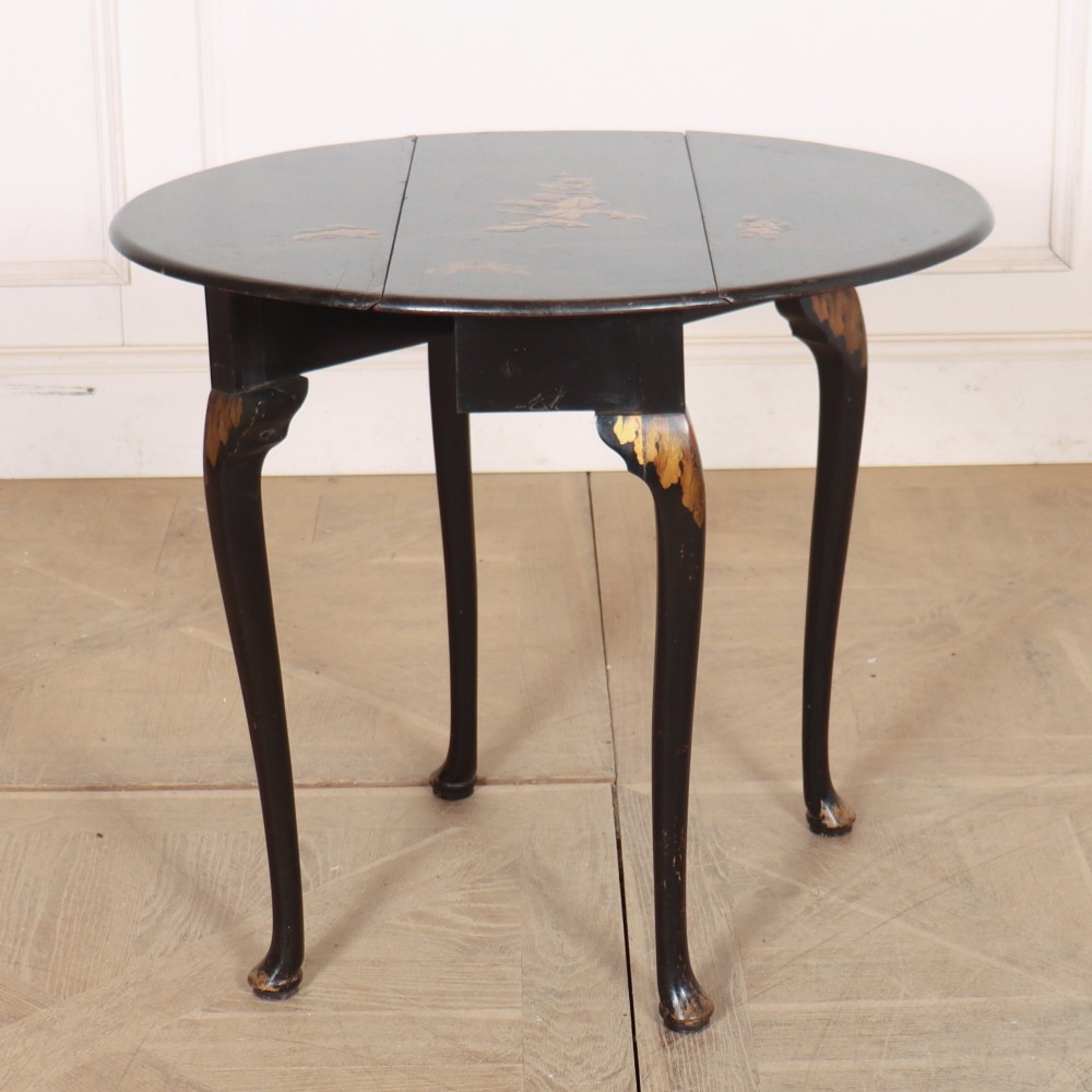 A small black lacquered drop-leaf side table featuring hand-painted gold Chinoiserie decoration and cabriole legs. View III