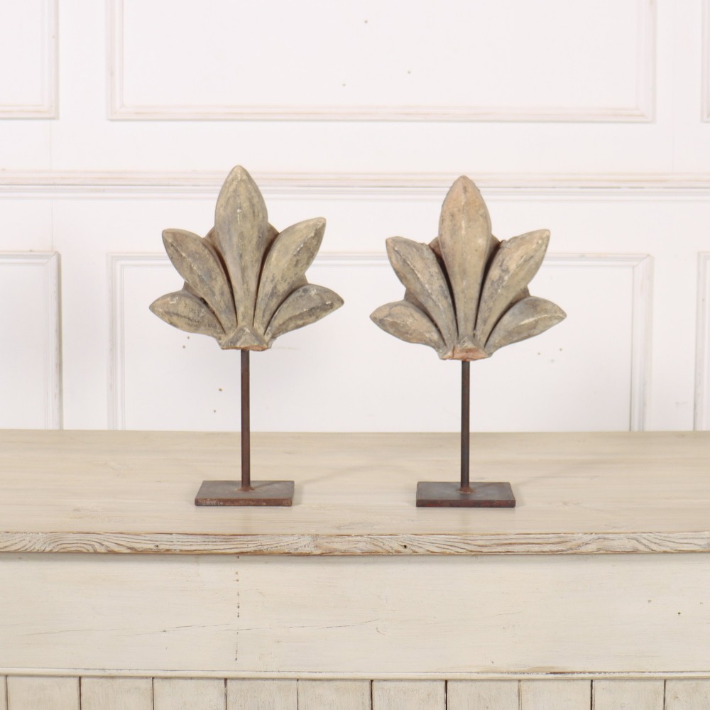 Pair of Stone Fragments on Stand