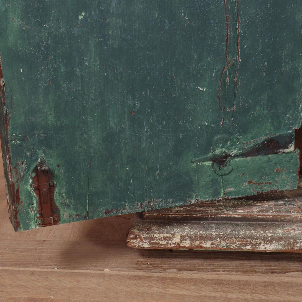 A long rectangular antique Italian side cabinet featuring four panelled doors in a distressed sage and teal painted finish with a plinth base. View X