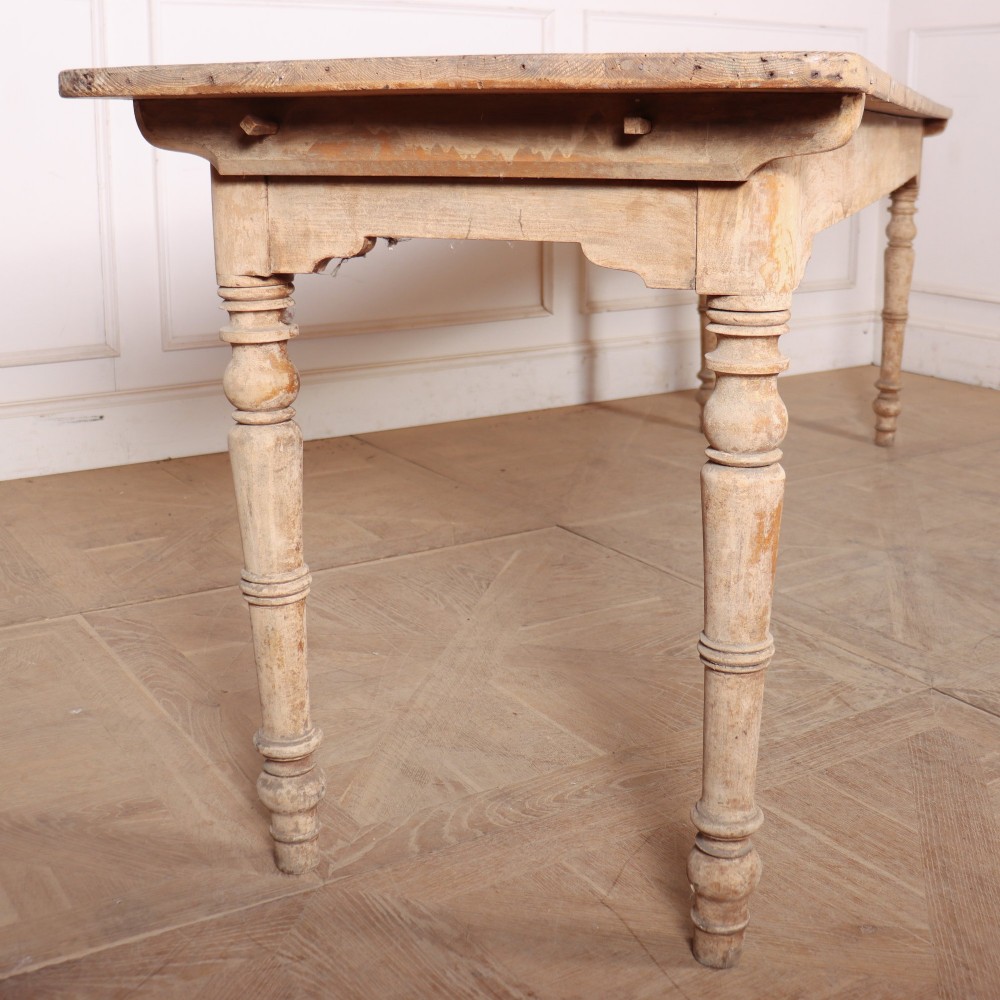 A long antique Italian painted wood farm table with turned legs and a distressed cream finish. View III