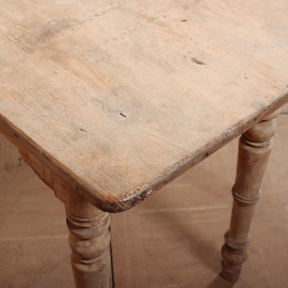 A long antique Italian painted wood farm table with turned legs and a distressed cream finish. View IX