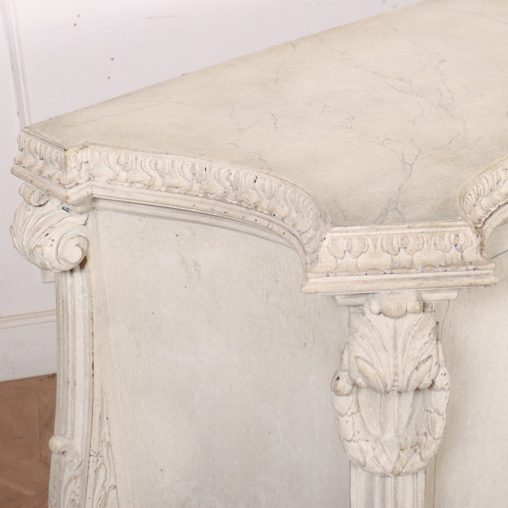 An off-white painted Italian Rococo side cabinet featuring carved acanthus leaf shoulders, a serpentine lower apron, double doors with painted blue trim, and prominent carved claw feet. View XIII