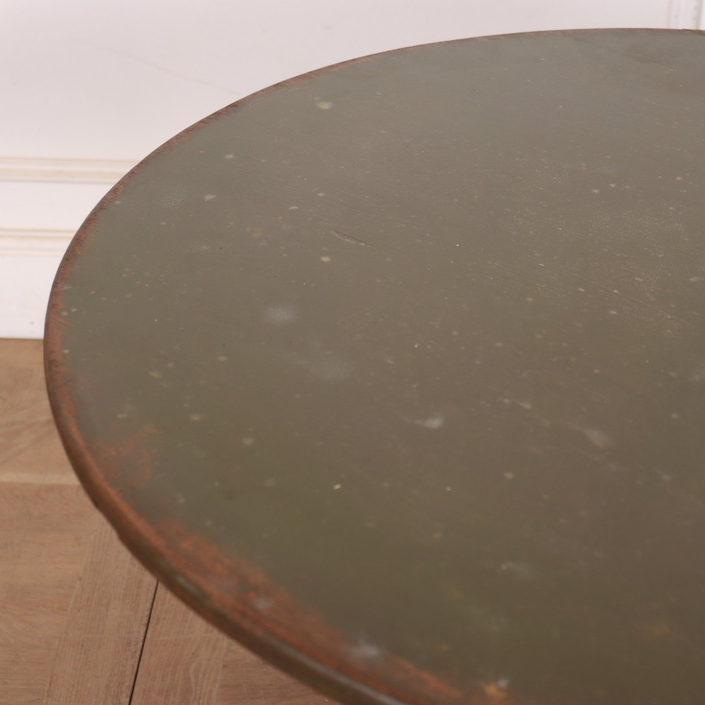 An antique Swedish painted wooden side table featuring a circular top, turned central pedestal, and scrolled tripod legs in a muted green finish. View IV