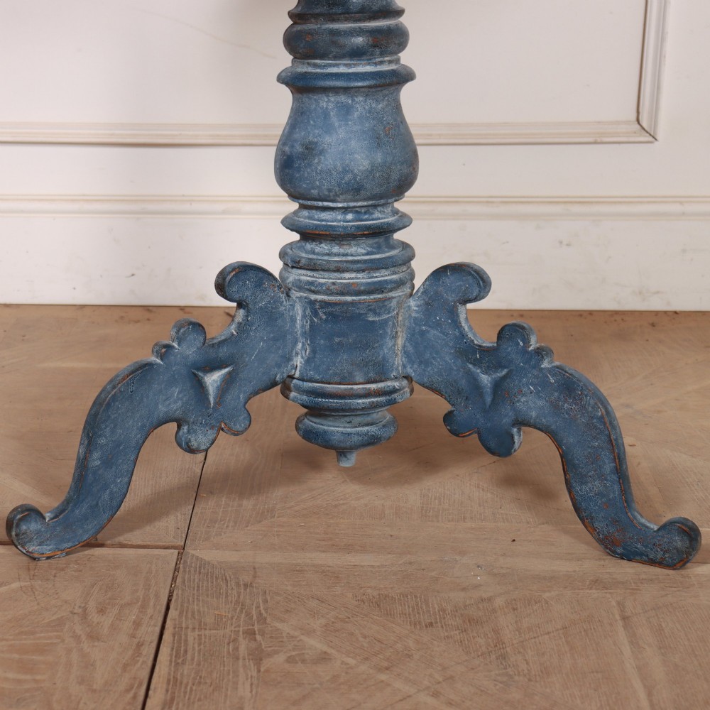 A Swedish blue painted occasional table featuring an oval top, turned central pedestal column, and carved tripod scroll legs. View II