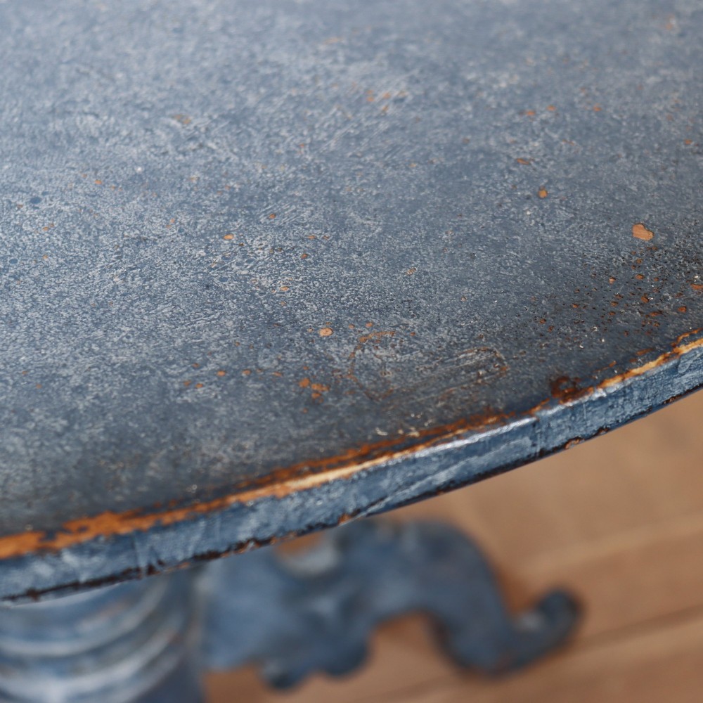 A Swedish blue painted occasional table featuring an oval top, turned central pedestal column, and carved tripod scroll legs. View VIII