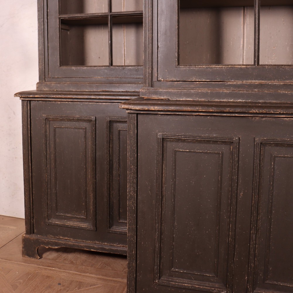 A pair of dark grey painted wooden dressers featuring glazed upper display cabinets with square mullions above panelled two-door lower cupboards. View III