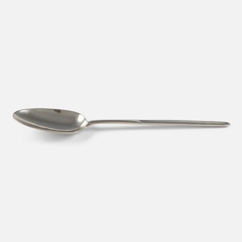fig 2. An 18th-century sterling silver marrow spoon featuring an oval bowl connected to a long, narrow channelled handle.
