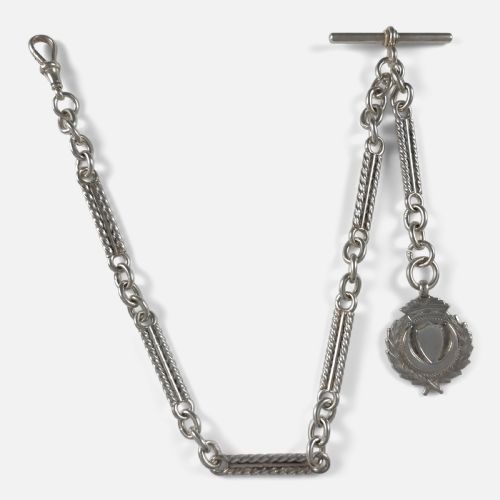 fig 2. A Victorian sterling silver Albert watch chain featuring fancy twisted bar links, a T-bar fastening, a swivel clip clasp, and a crest-shaped fob.