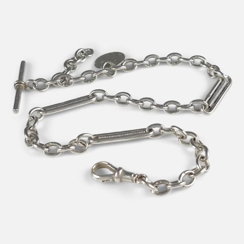 fig 1. A Victorian sterling silver Albert watch chain featuring fancy coiled link sections, a T-bar, a swivel clasp, and an attached silver coin fob.