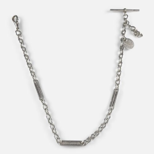 fig 2. A Victorian sterling silver Albert watch chain featuring fancy coiled link sections, a T-bar, a swivel clasp, and an attached silver coin fob.