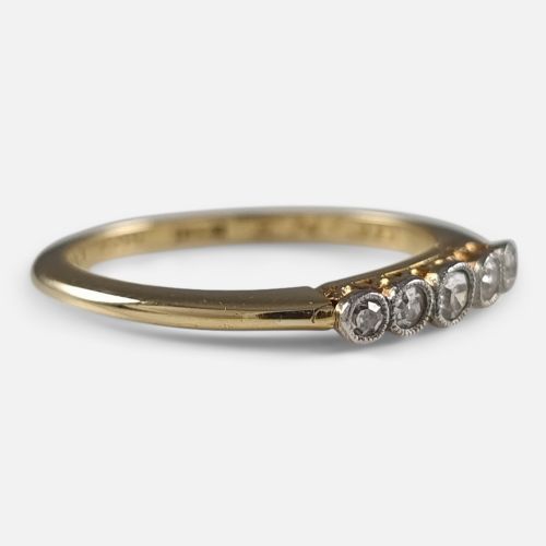 fig 3. An 18ct yellow gold band mounted with five round diamonds in platinum millegrain rub-over settings.