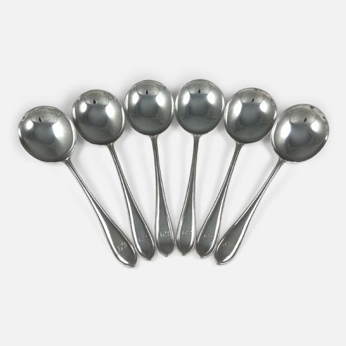 fig 1. A set of six polished sterling silver soup spoons with round bowls and tapered handles featuring stepped terminal details.