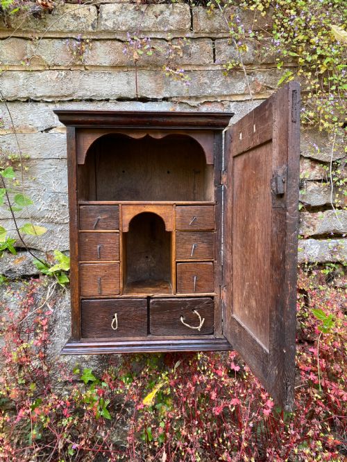 an early oak spice wall cupboard - CATEGORY: ANTIQUE CUPBOARDS - DATED 18TH CENTURY