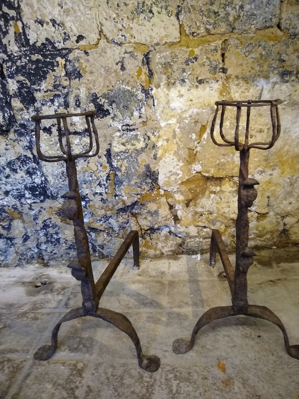 Pair of 17th c. andirons with cresset tops