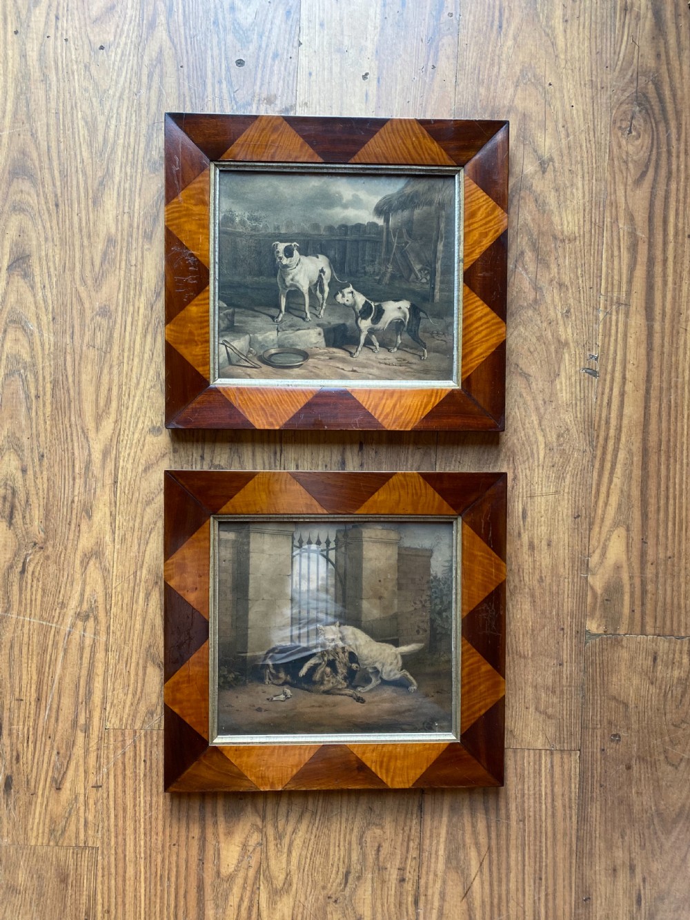 Pair of antique Prints in Unique Frames