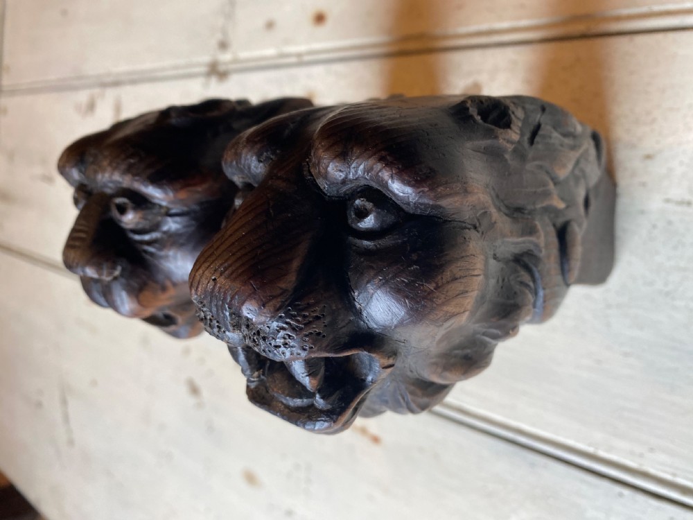 Pair of Carved Wood Lion Heads