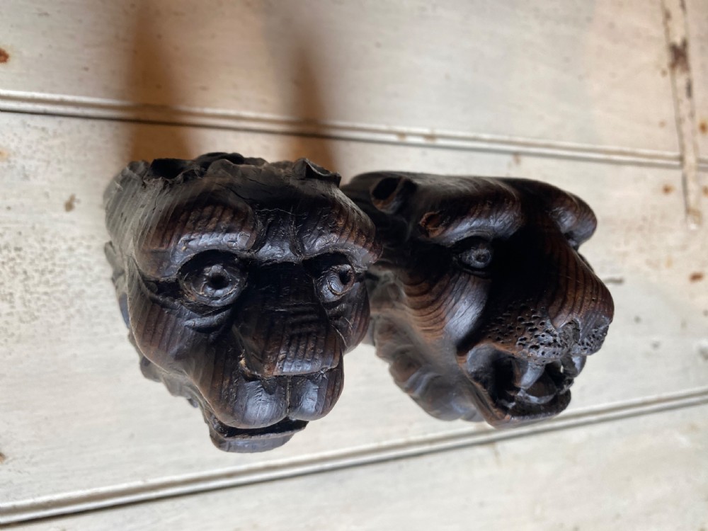 Pair of Carved Wood Lion Heads View II