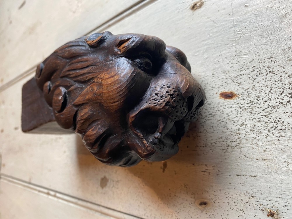 Pair of Carved Wood Lion Heads View XI