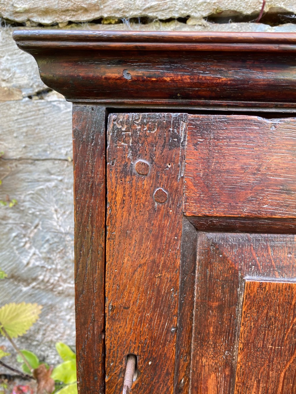 An Early Oak Spice wall Cupboard  View V