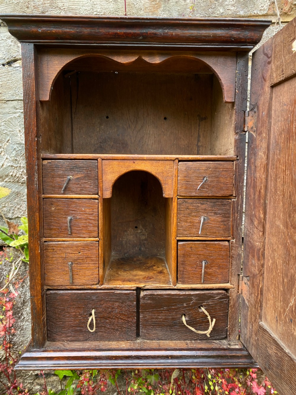 An Early Oak Spice wall Cupboard  View IX