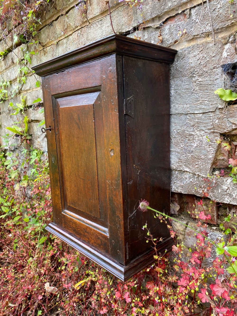 An Early Oak Spice wall Cupboard  View X