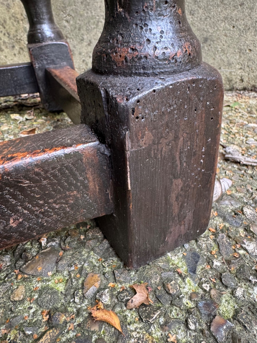 A dark oak joint stool featuring turned baluster legs, lower perimeter stretchers, and a flat rectangular top. View XVI