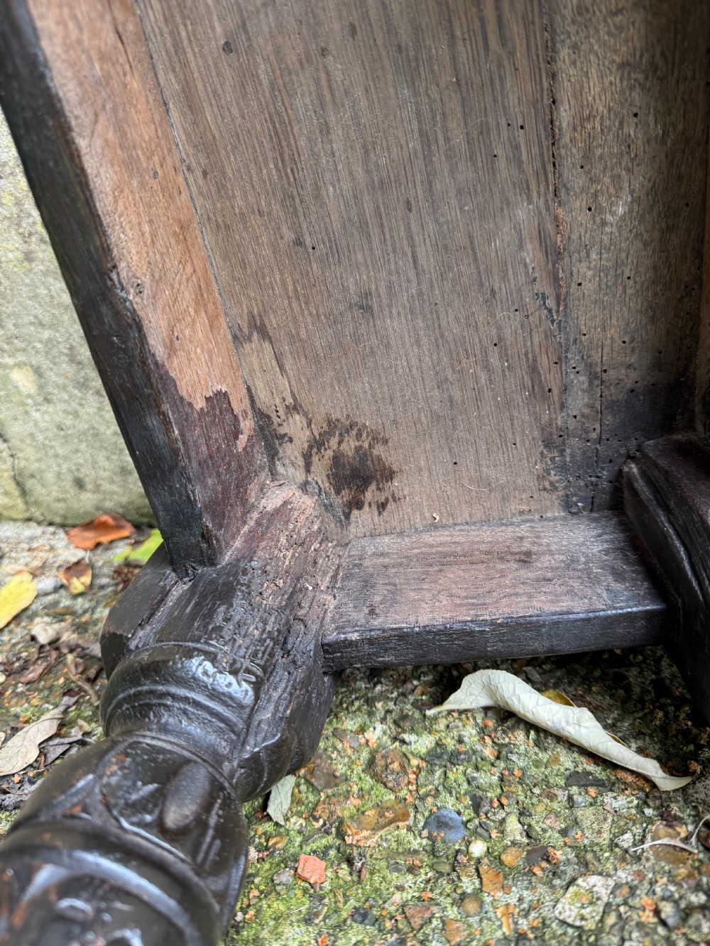 A dark oak joint stool featuring turned baluster legs, lower perimeter stretchers, and a flat rectangular top. View XVIII